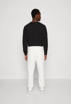 YOURTURN Tribal Embossed Unisex - Tracksuit Bottoms - Off White -Yourturn Online Shop 0fcbe1c0382e461592b0c9f316390e14