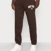 YOURTURN Unisex - Tracksuit Bottoms - Dark Brown 2 YOURTURN Unisex - Tracksuit Bottoms - Dark Brown -Yourturn Online Shop e1108e6c89a84640b8c8bc8fe7ba75bc